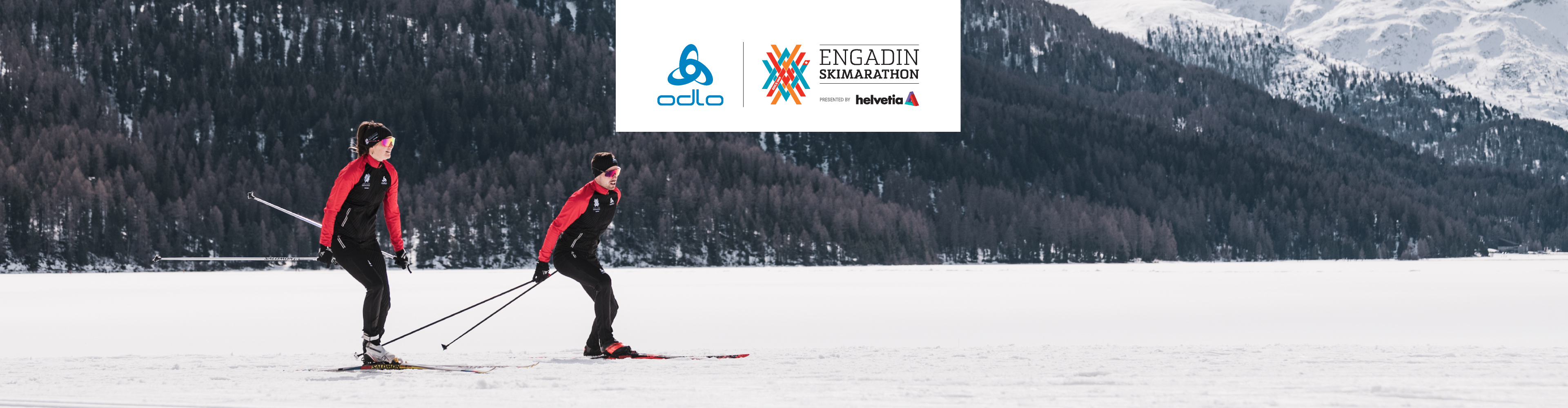 women and men cross-country skiing in the EKM Odlo outfit