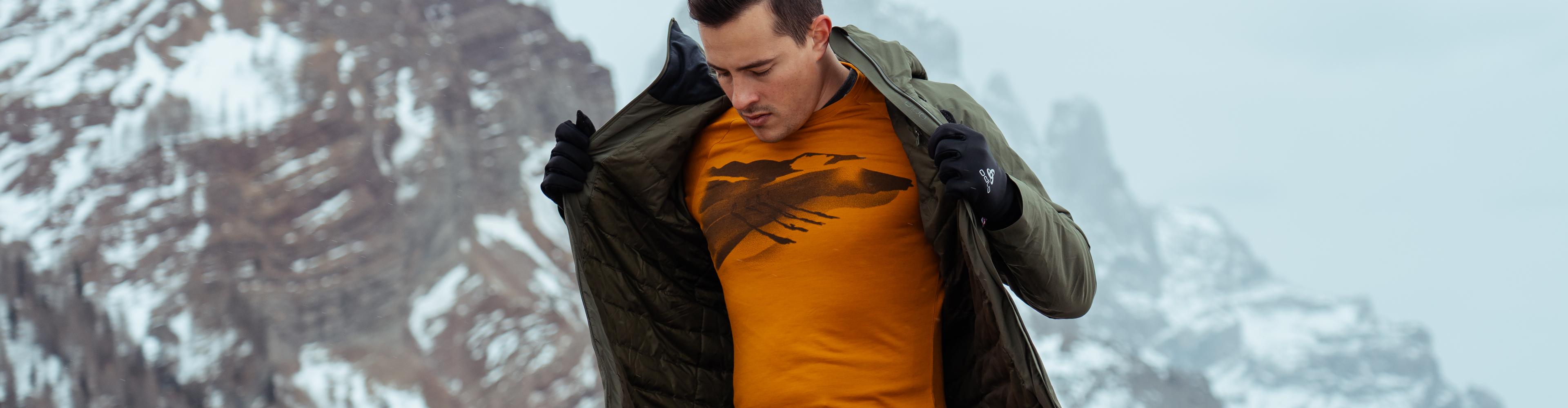 A man wearing a longsleeve crafted with merino wool