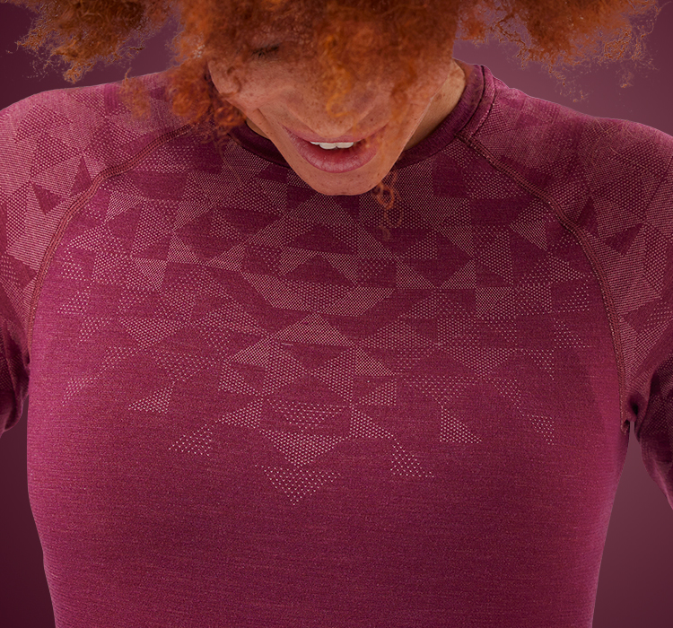 A woman wearing a light merino underwear outfit