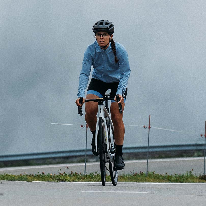 A woman wearing cycling gear