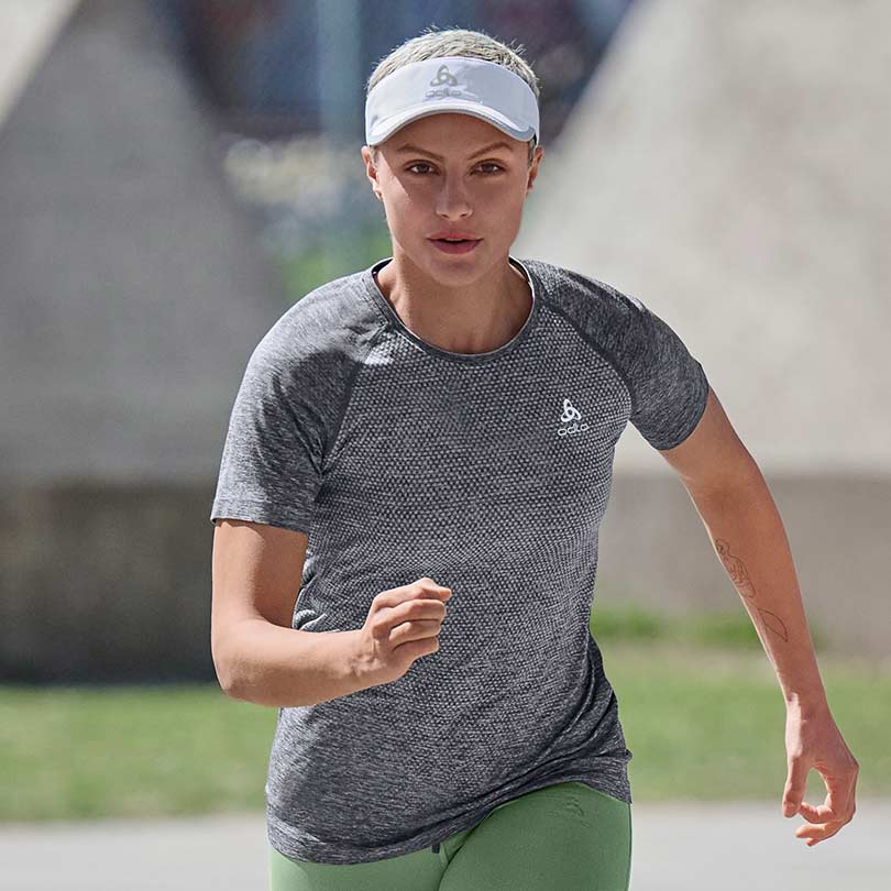 A woman wearing essential running clothing
