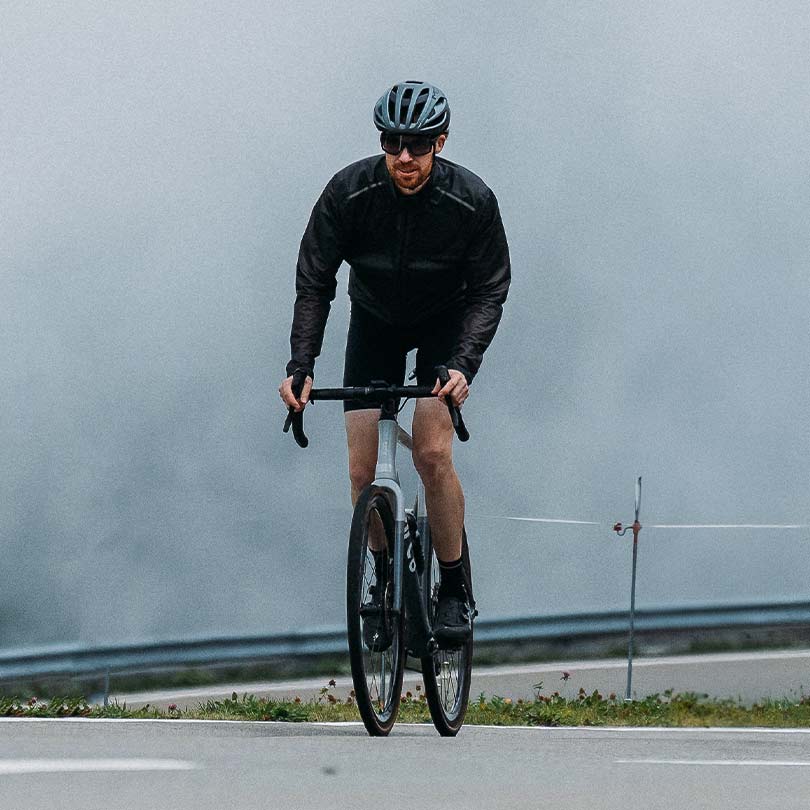 A man wearing cycling gear