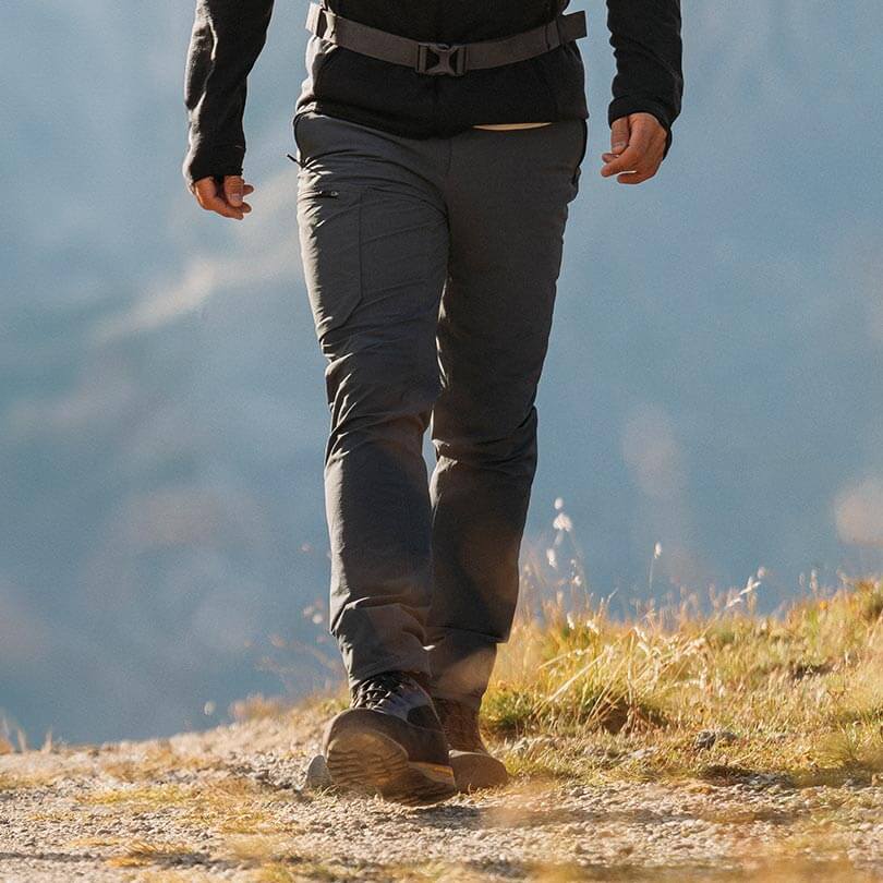 A man wearing hiking pants