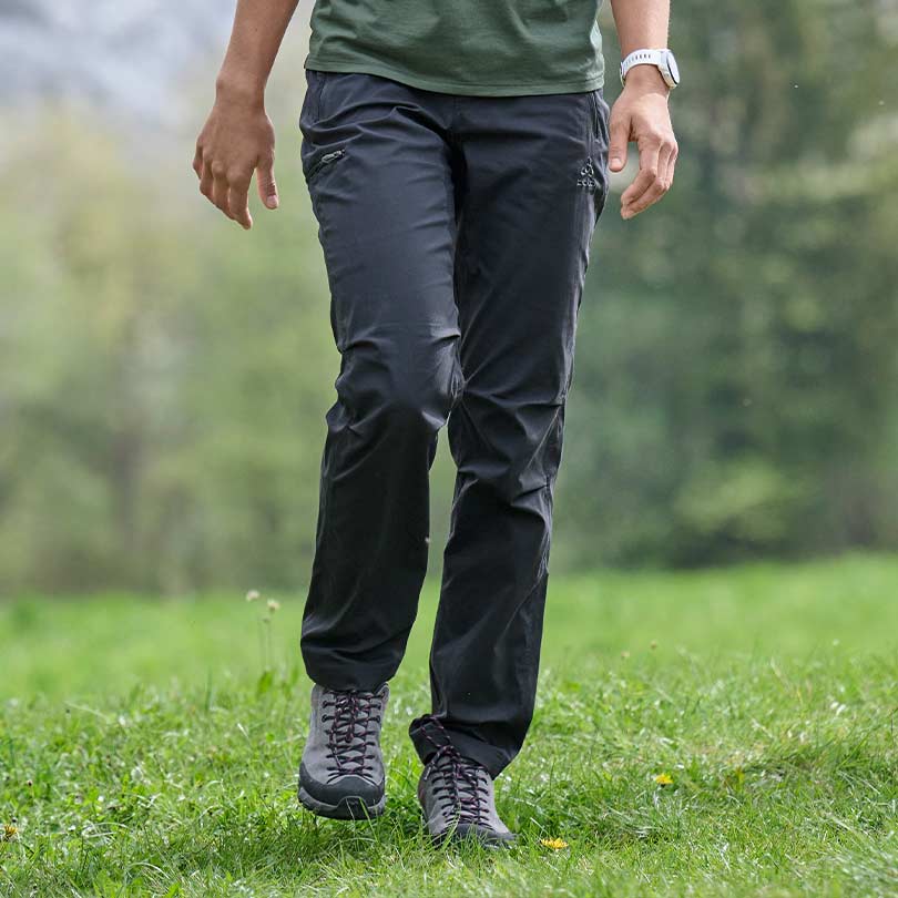 A woman wearing hiking pants