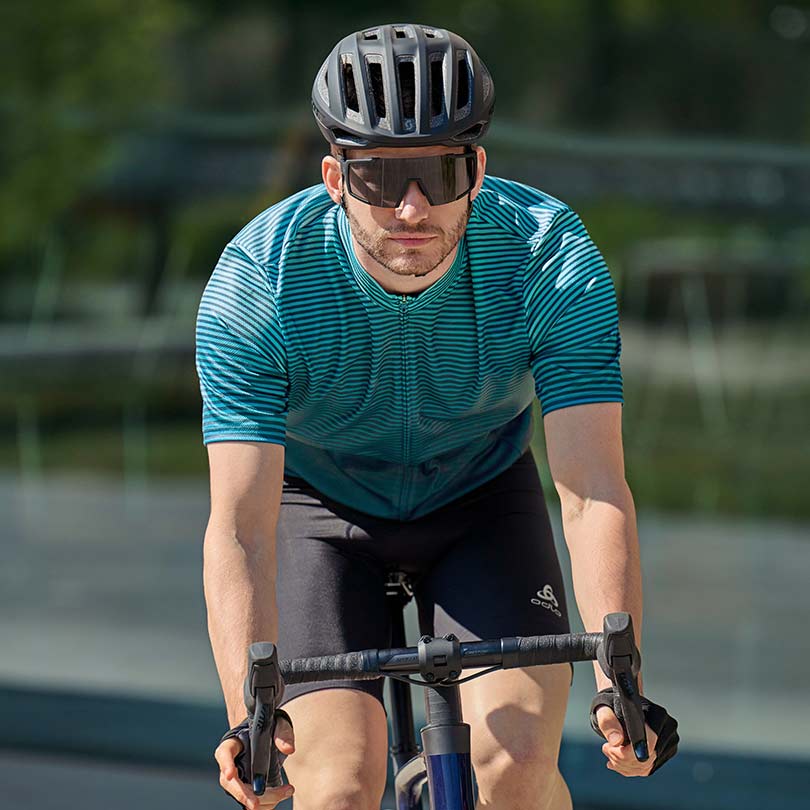 A man wearing essential cycling clothing